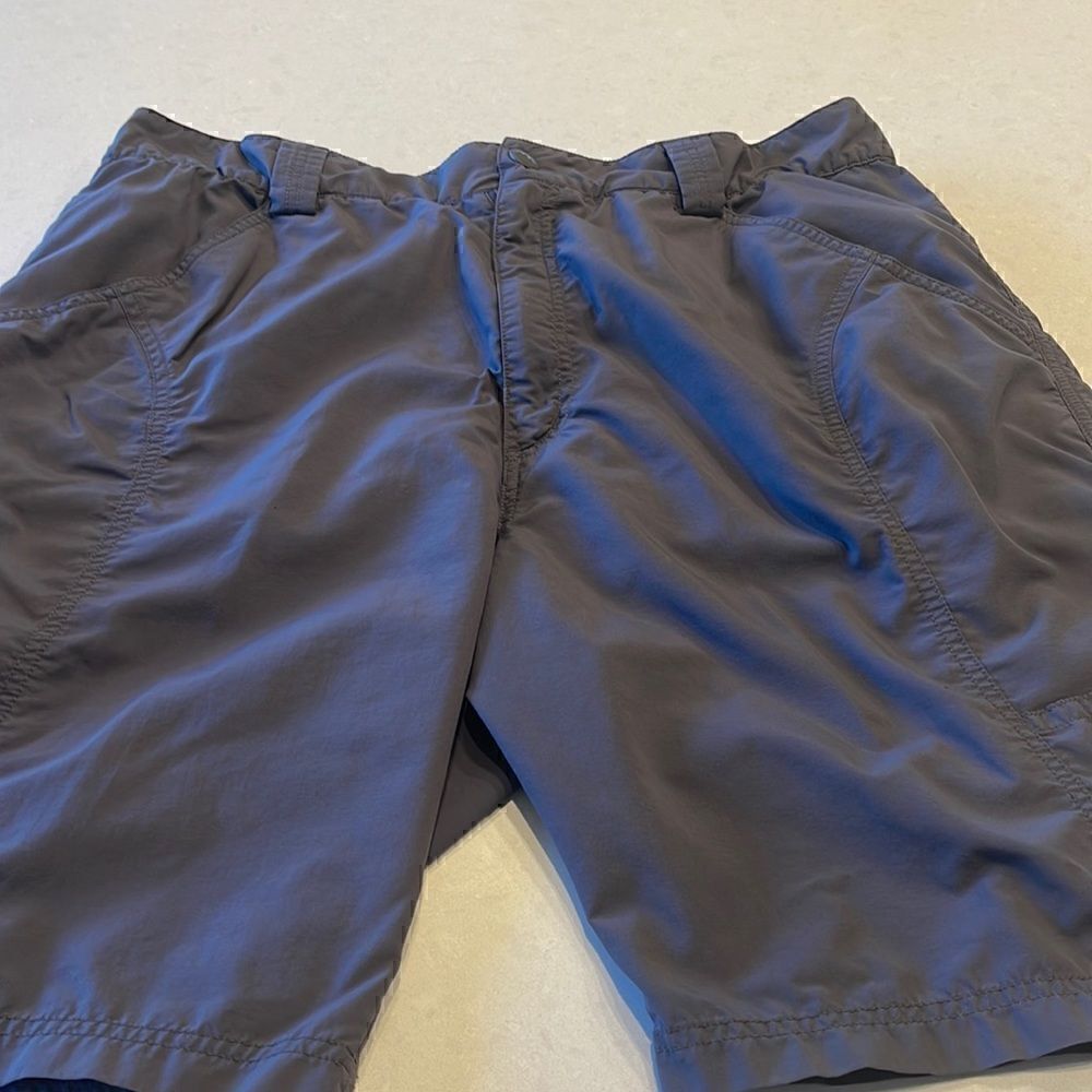 Cloudveil mens shorts size 40, dray gray small pin hole see picture. Zipper pock